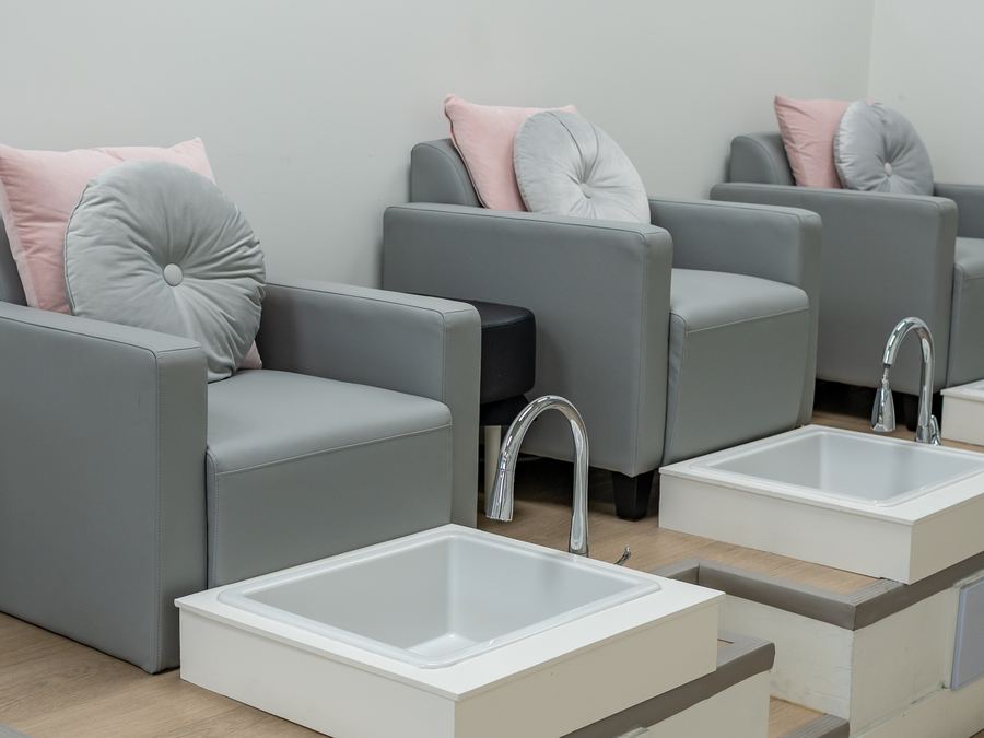 Pedicure chairs in the Arked Brow Bar studio, photographed by Newhive